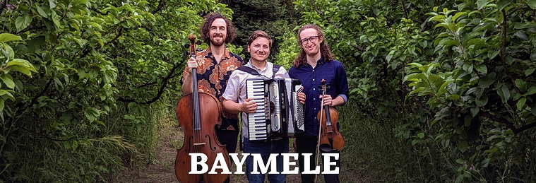 three men with instruments in forest