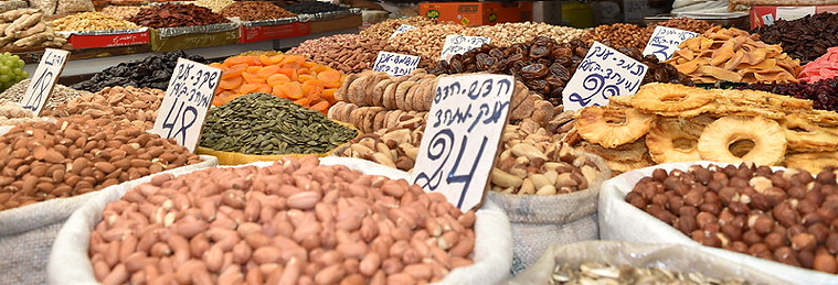 Fruits & nuts for sale in baskets at market