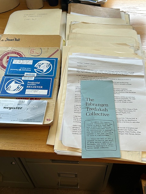 papers and folders on table